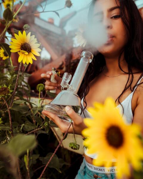 girl smoking from a bong